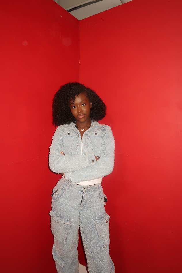 Portrait against a vivid red backdrop