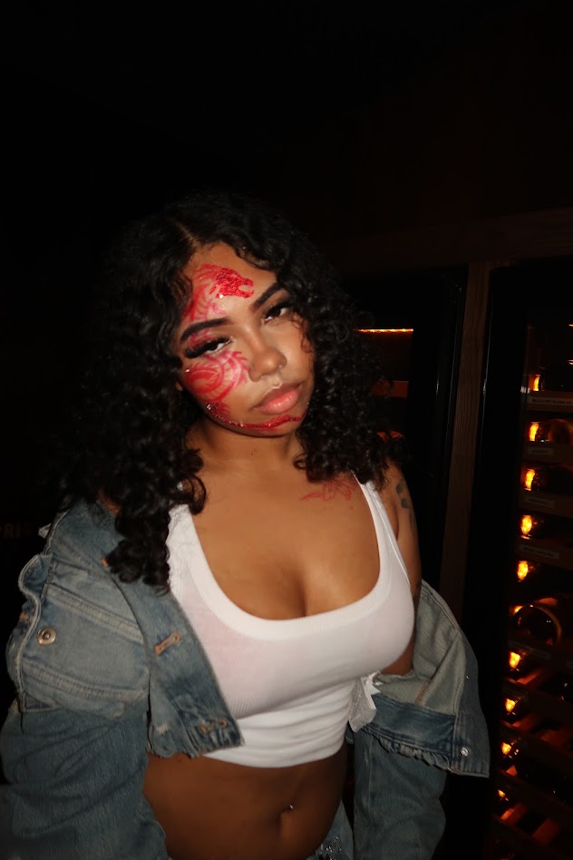 Creative makeup portrait at a nighttime event